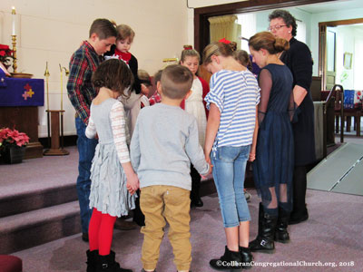 Prayer at Collbran Congregational Church in Collbran Colorado